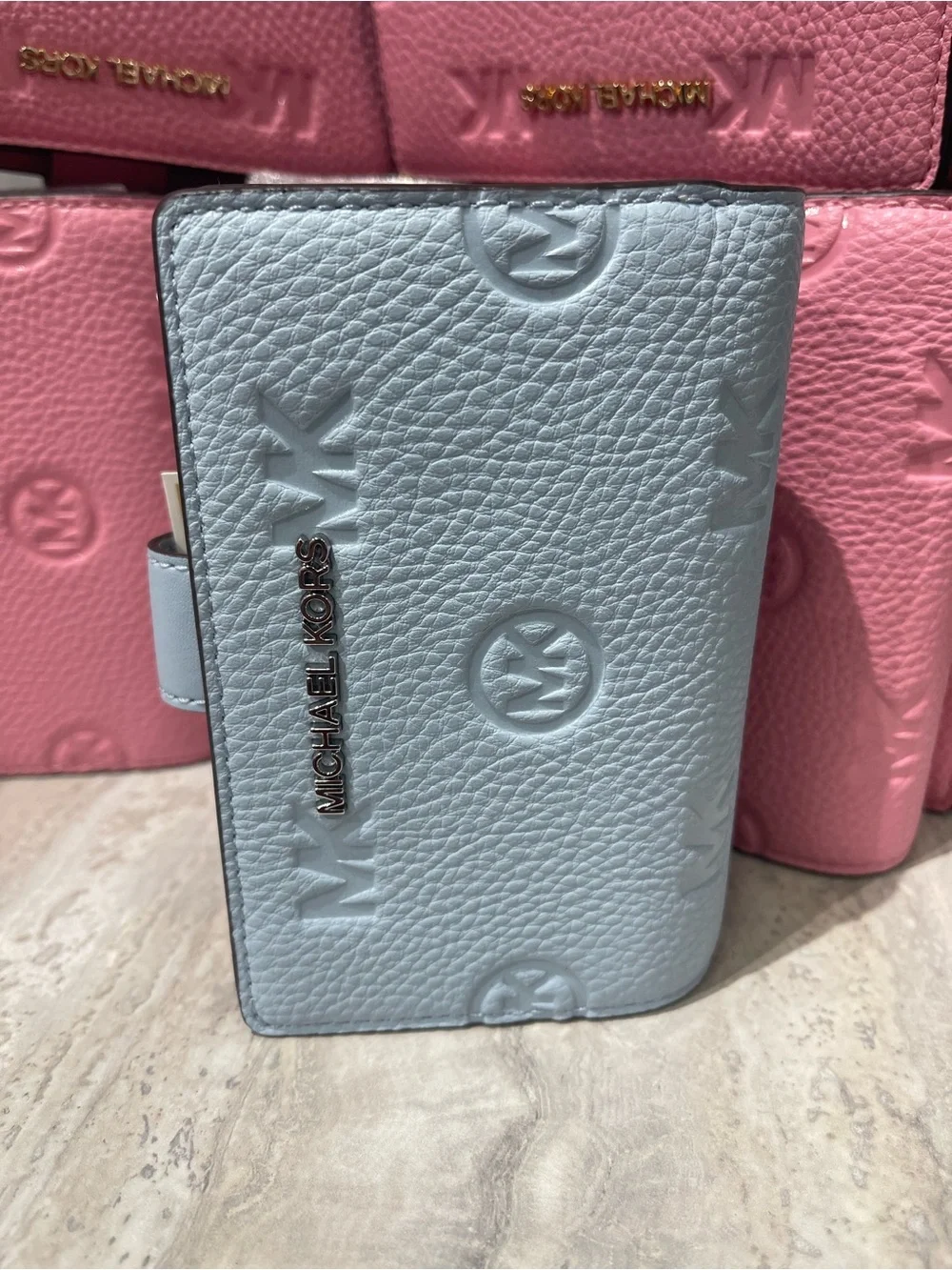 Michael Kors Embossed Logo Trifold Wallet - Light Blue